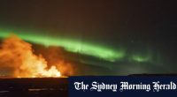 Timelapse video shows eruption amid northern lights