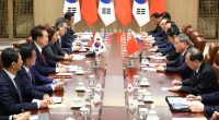 China warns South Korea against politicising trade before Japan talks