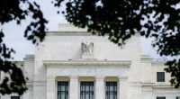 What will be the Federal Reserve’s long-term outlook for interest rates?