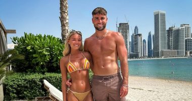 Which Love Island contestant who plays football has appeared at the highest level alongside England internationals and Premier League teammates, as well as featuring in a video game?