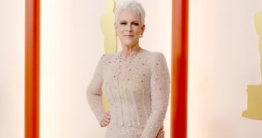 Jamie Lee Curtis smiles at the Academy Awards