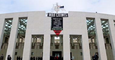 Protestors unfurl ‘war crimes’ banner on Australian parliament | Israel-Palestine conflict